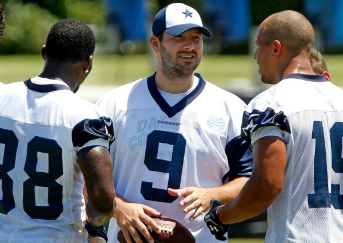Tony Romo was limited to walk-throughs and light throwing after offseason surgery. (Getty Images)